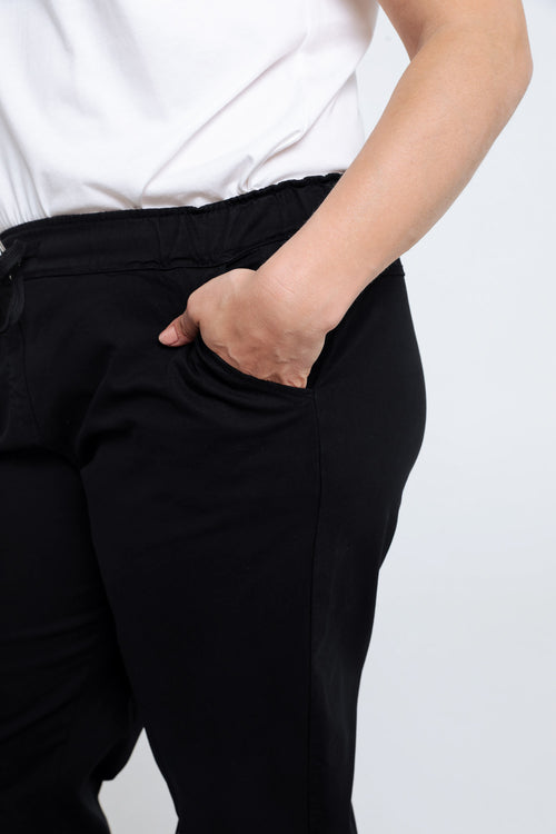 Effen 7/8-chinobroek in licht katoen met losse broekspijpen-Paprika-5