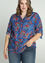 Lange, opengewerkte blouse met bloemenmotief