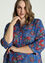 Lange, opengewerkte blouse met bloemenmotief